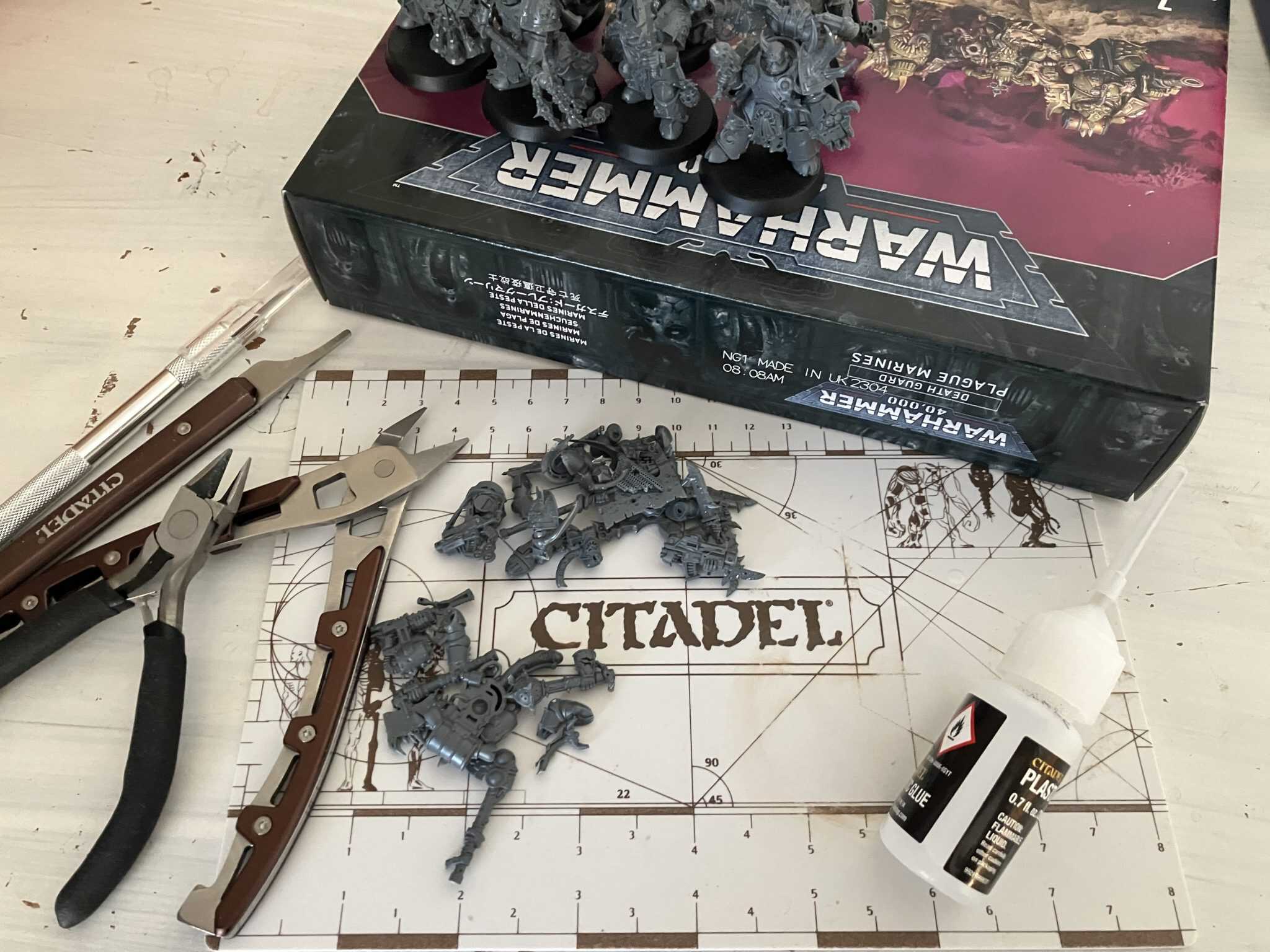 Master the Art of Assembling Warhammer Miniatures: Tools and Techniques